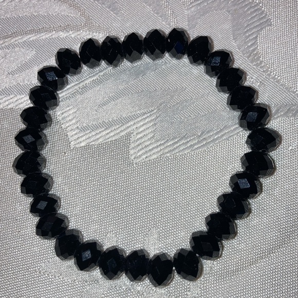 Bracelet w/blk glass faceted beads on elastic so fits most wrists.    $9 - Picture 3 of 3